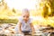 Outdoor portrait of a baby on all fours. crawling on knees child