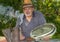 Outdoor portrait of bearded elderly man bee-keeper