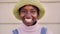 Outdoor portrait of a cheerful black woman looking at the camera smiling. Close up of a happy human face