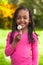 Outdoor portrait of a cute young black girl - African people