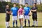 Outdoor portrait of a group of young asian athletes