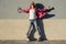 Outdoor portrait of a happy teenage girl with a chocolate bar an