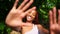 Outdoor portrait natural Beautiful young African American woman red braids hair style, perfect white teeth smile