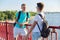 Outdoor portrait of two friends boys teenagers 15, 16 years old, talking laughing