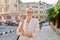 Outdoor portrait of young business positive woman in the city