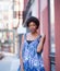 Outdoor portrait of young fashionable African American woman