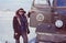 Outdoor portrait of young soviet driver near his truck