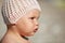 Outdoor profile portrait of curious Caucasian baby