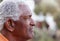 Outdoor Profile Portrait Of Serious African American Senior Man With Mental Health Concerns