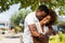 Outdoor protrait of african american couple embracing each other