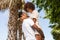 Outdoor protrait of black african american couple - Guy carrying girfriend on his back