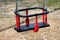 Outdoor public playground equipment strong plastic red and black swing seat with safety frame for small children and connected