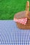 Outdoor Rustic Picnic Table With Hamper And Blue Tablecloth