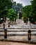 Outdoor scene of The Navel City Pillar with multiple rows of stone steps, leading upwards