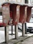 Outdoor scenery in the afternoon with abandoned payphone stand.