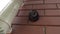 Outdoor Security Camera on a Brick Wall of a House. CCTV camera