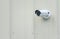 Outdoor Security camera On Plain Wall with Copy Space