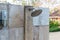 Outdoor shower at swimming pool.  shower cabins behind outdoor swim pool .Outdoor shower area design at the beach, seaside or swi