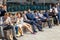 Outdoor space in Canary Wharf packed with people drinking and eating