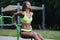 Outdoor sport Beautiful strong athletic muscular young caucasian fitness woman workout training in the gym on diet pumping up