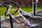 Outdoor sports equipment is tied up with barrier tapes during COVID-19 or coronavirus quarantine or pandemics, repair. Prohibiting