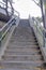 Outdoor staircase with concrete steps and metal bar railings at San Francisco, California