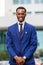 Outdoor standing portrait of a African American business man