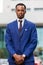 Outdoor standing portrait of a African American business man