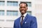 Outdoor standing portrait of a African American business man