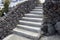 Outdoor steps with volcanic rock walls