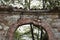 Outdoor stone archway in Tuscany, Italy.