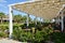 Outdoor summer restaurant with tables and chairs near Pamucak, Ephesus Beach, Kusadasi, Turkey