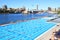 Outdoor swimming pool in harbor people relax