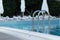 Outdoor swimming pool in the hotel , sun loungers , relaxation , vacation