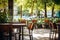 Outdoor table of coffee cafe and reataurant. Summer terrace on city street. Empty outside tables and chairs of outdoor cafe on