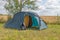 Outdoor tent built on meadow