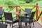 Outdoor terrace cafe table with three chairs