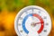 Outdoor thermometer shows warm temperature - hot indian summer