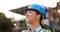 Outdoor, thinking and woman with construction, engineer and planning with a helmet, project or real estate. Person