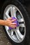Outdoor tire car wash with sponge