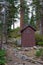 Outdoor toilet in forest