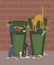 Outdoor trash cans full of garbage with cats cartoon