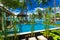 Outdoor tropical massage gazebo on the beach next to swimming po