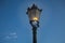 Outdoor Victorian Style Pillar Lantern. Roadside Black Iron Cast Single Lamp Post. Streetlight with Dirty Smoked Glass