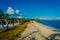 Outdoor view of beautiful huts located along the beach in PLaya del Carmen at Caribbean Sea in Mexico