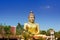 Outdoor view Golden buddha statue place of worship