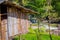 Outdoor view of a gorgeous house building with bamboo cane in tropical rainforest with a river behind in Chiang Mai