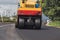 Outdoor working : Road roller working on the new road construction site