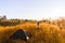 Outdoors camping grass highlands mountain in the Sunset