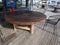 Outdoors rustic wooden table made of cable drum